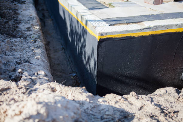 Professional Emergency Waterproofing technician working in Hollywood, MD
